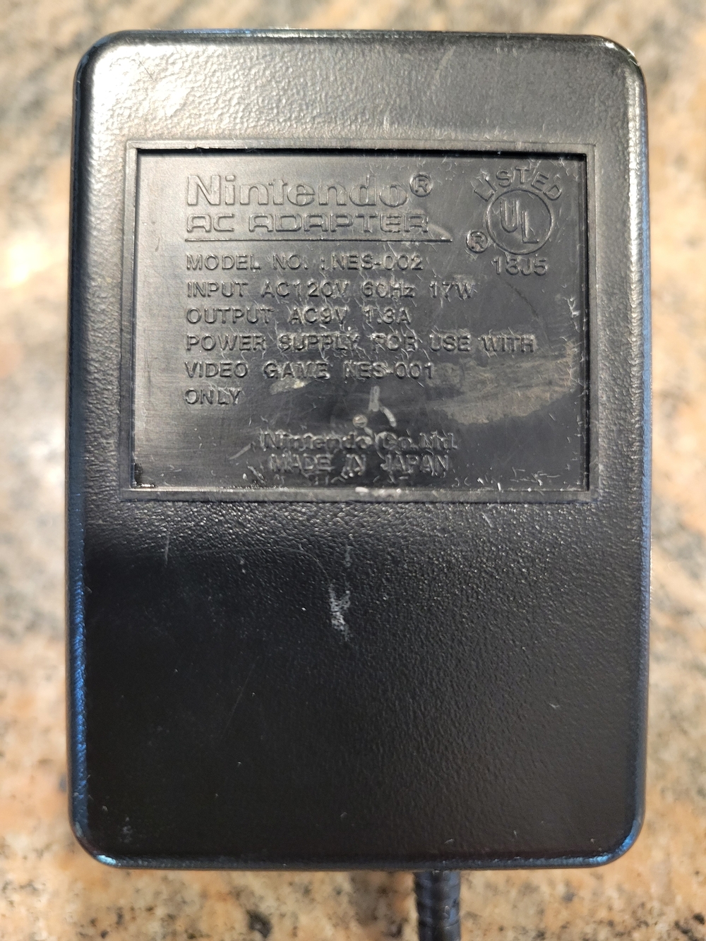 Official Nintendo AC Adapter. Black plastic exterior. Standard Power Cord. $13